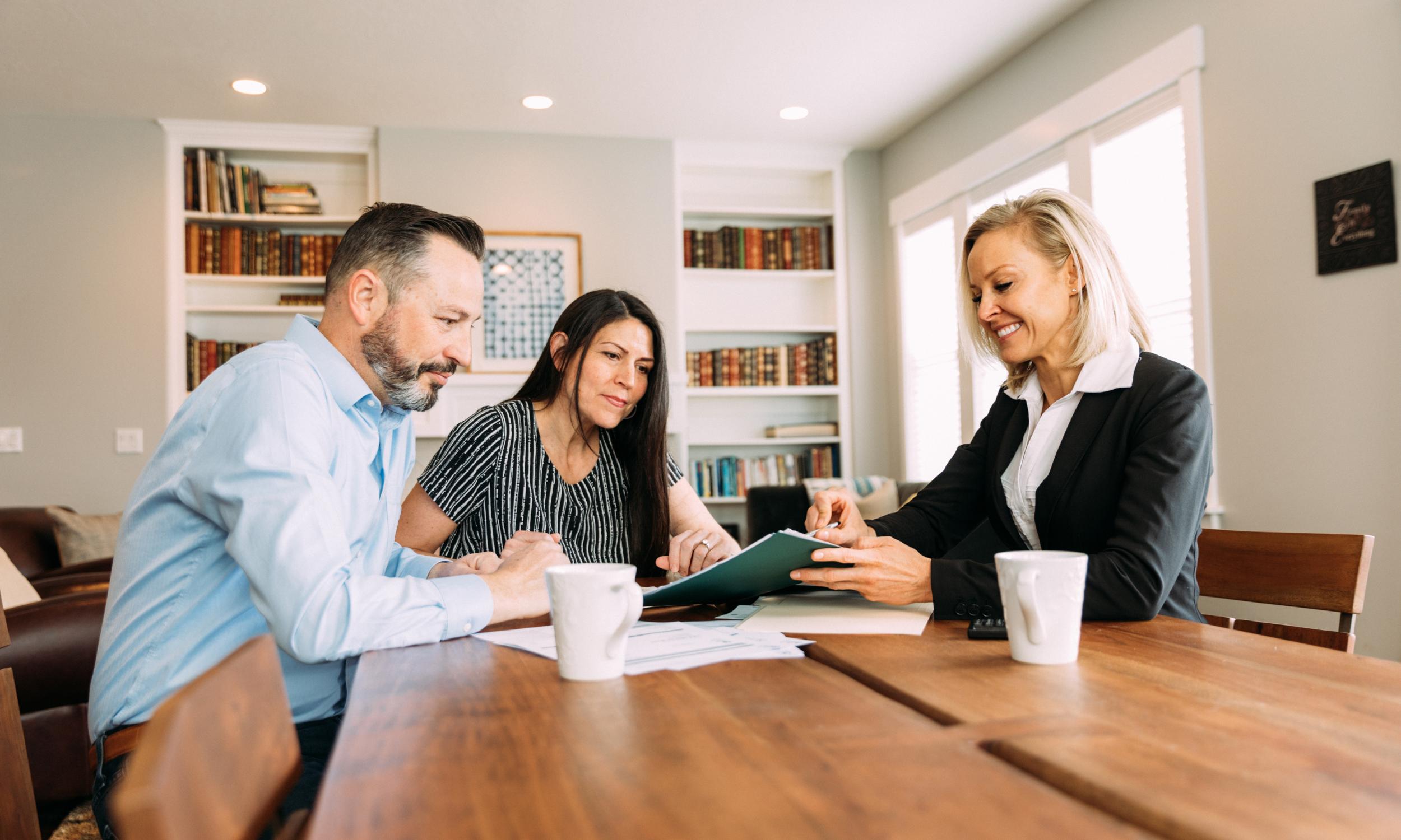 American homebuyers discussing mortgage options with a mortgage professional